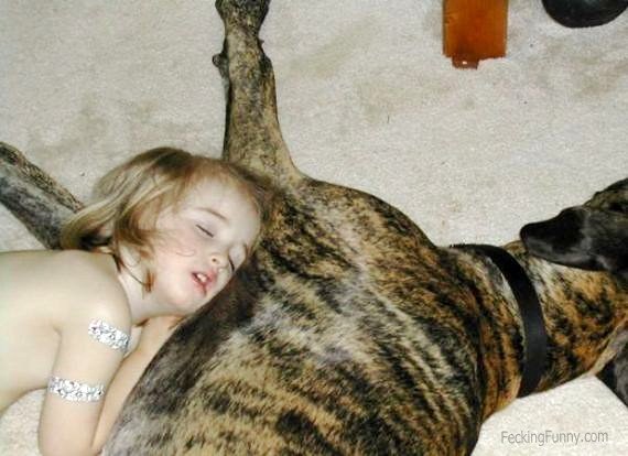 naked-girl-sleeping-with-dog