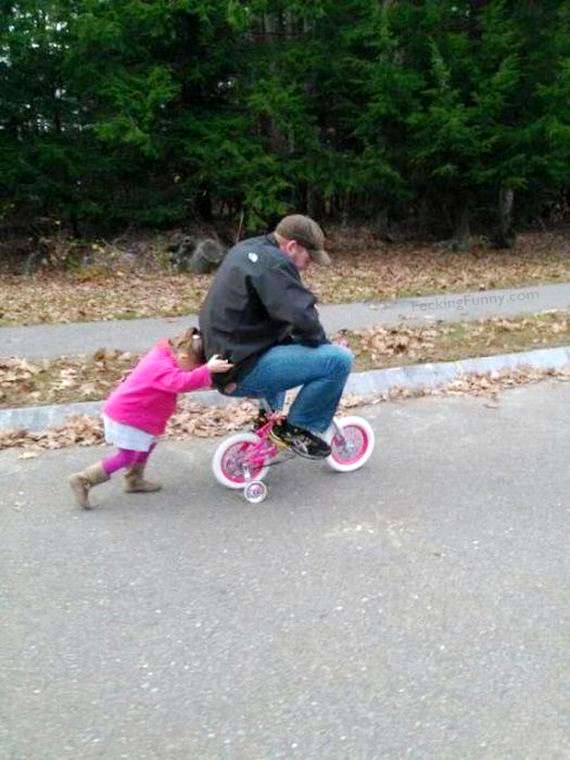 funny-daddy-riding-baby-bicycle