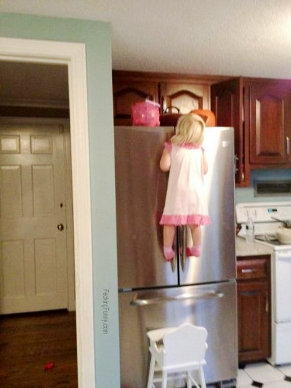 funny-girl-climbing-refrigerator