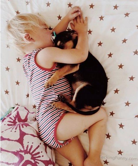 funny-kid-sleeping-with-dog
