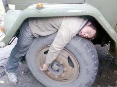 funny-drink-and-sleep-on-car-wheel
