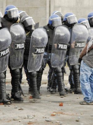 Funny protester: peeing on riot police