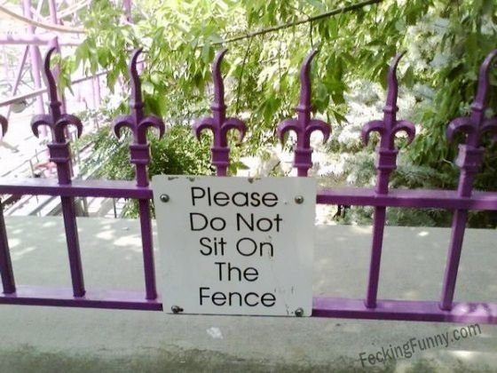 funny-sign-no-sit-on-fence