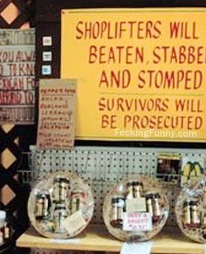 Funny sign, shoplifters will be beaten, stomped, stabbed..