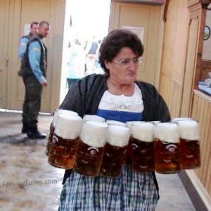 woman-holding-12-beer-jugs