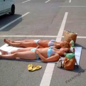 sexy-girls-sun-bath-in-car-park