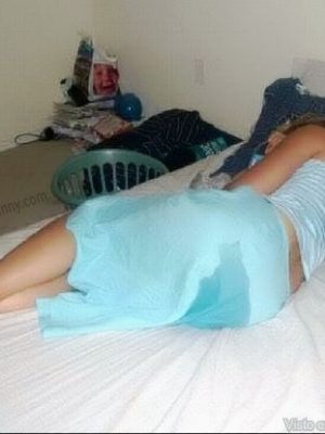 Drunken girl peeing on her bed