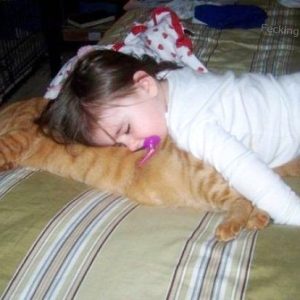 baby-sleeping-with-cat