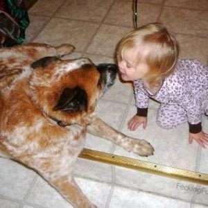girl-kissing-with-dog