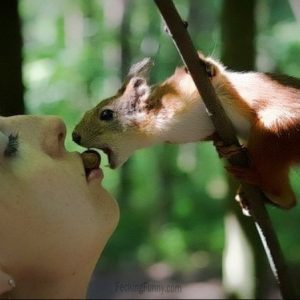 woman-kiss-with-squirrel