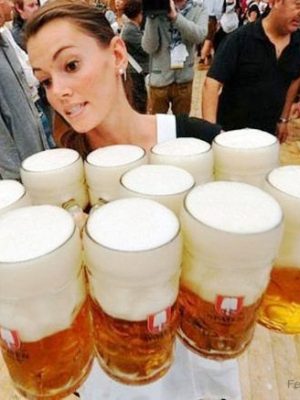 Woman holding 10 jars of beer