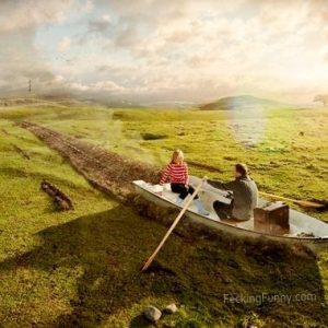 romantic-couple-rol-the-boat-on-grass