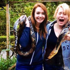smile-girl-with-scared-girl-snake